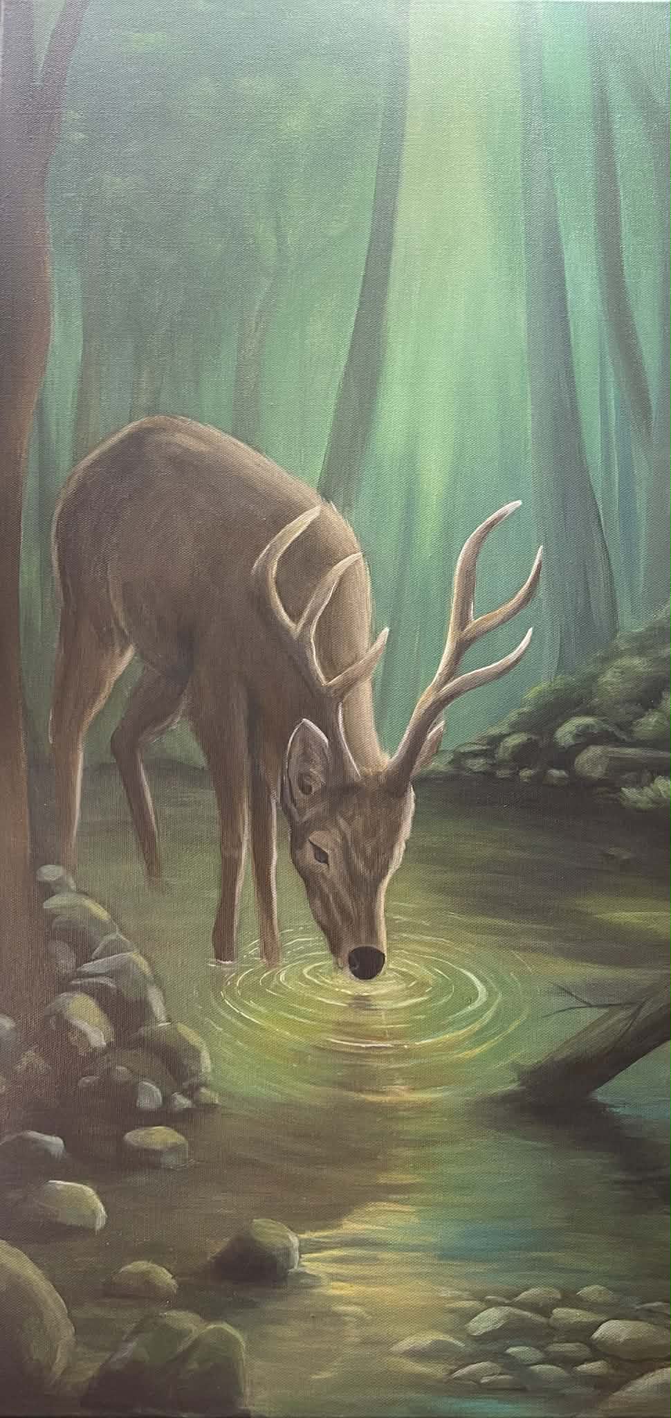 Deer drinking from a glowing forest stream